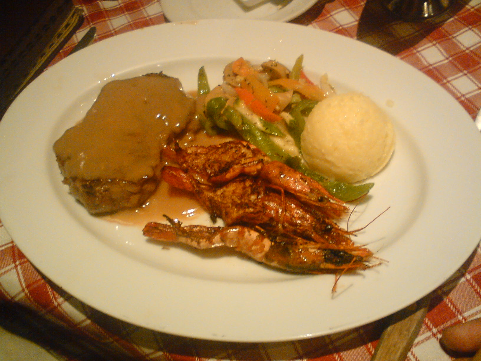 tenderloin steak and grilled butterfly prawns