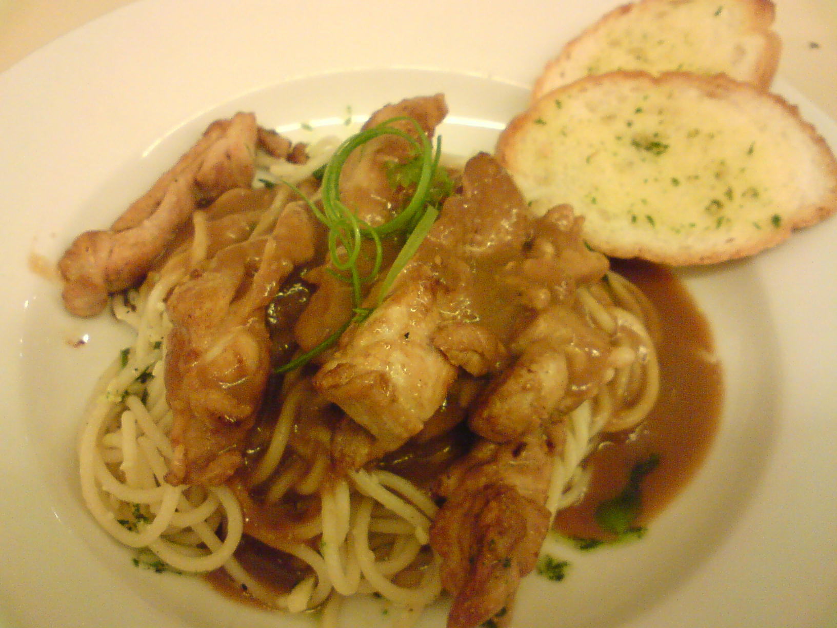 Chicken fillet with steak sauce and pasta at KXP